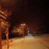 Bahnsteig Littenweiler im Schnee bei Nacht